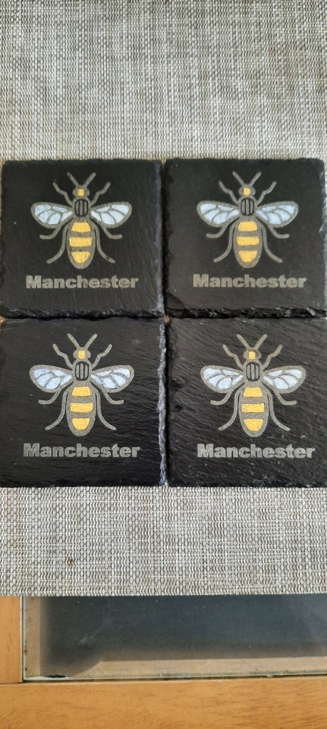 Natural Slate Coasters with a Manchester Bee Logo