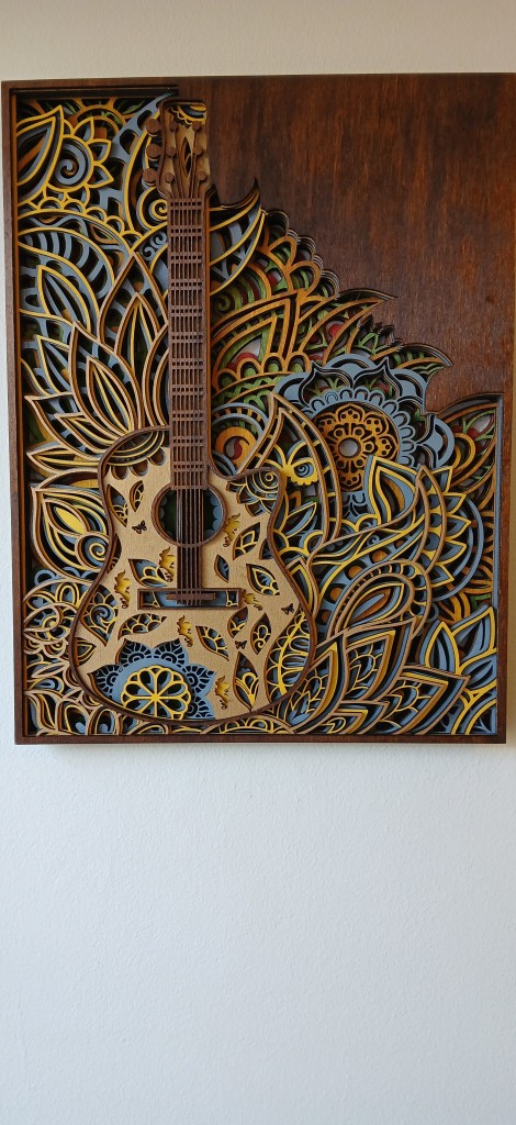 7 Layer Design Featuring a Guitar